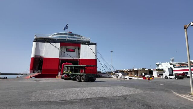 Heraklion Port, Crete, Greece, Europe. 02. 07. 2024.  Roll on roll off ferry with stern door open to allow a truck and trailer to board,