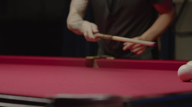 Man misses and misses the target while playing Russian pool. Medium shot. Slow motion