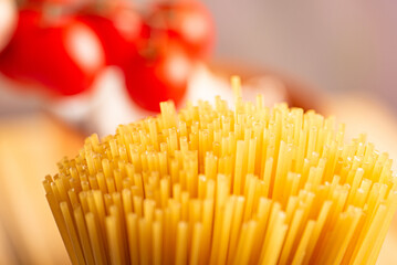 Pasta, table with pasta, ingredients and utensils, selective focus.