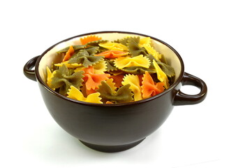 Multi-colored pasta in the form of bows. farfalle pasta