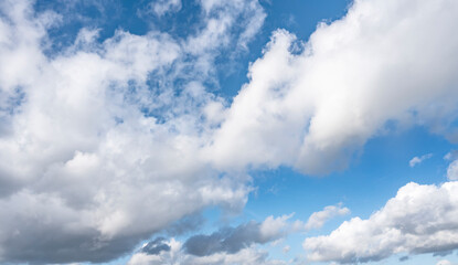 White Clouds in Blue Sky on Sunny Day © Iryna