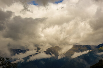 Low clouds floating over t he mountains in the eastern Andean range of Colombia, in a overcast afternoon, near the town of Arcabuco.