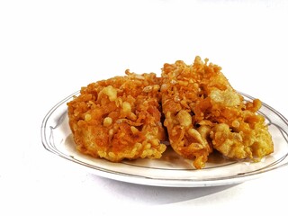 Fried Bananas in a glass plate on a white background