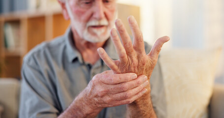 Senior, man and hands pain in home, arthritis and osteoporosis and muscle issue for healthcare....