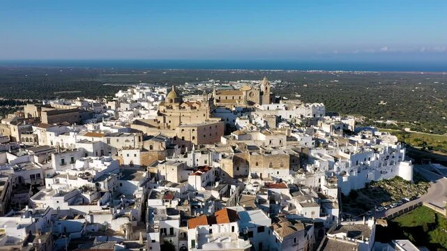 View of Ostuni white town, Brindisi, Puglia (Apulia), Italy, Europe. Old Town is Ostuni's citadel. Ostuni is referred to as the White Town. Ostuni white town skyline and church, Brindisi, Italy.