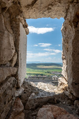 A view of the surroundings through the window of the old castle