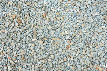 Close-up view of textured stone pile on carpet