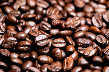 Background with many roasted coffee beans,Texture of roasted coffee beans