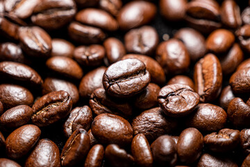Background with many roasted coffee beans,Texture of roasted coffee beans