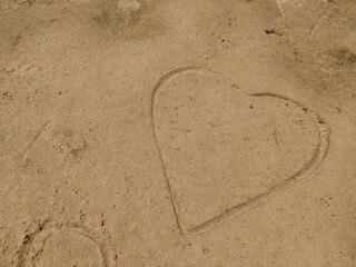 A heart is drawn on the sandstone