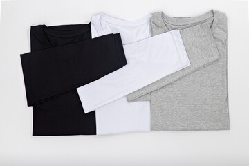 mockup long-sleeved t-shirts, cotton, basic, neutral colors, photo taken in the studio, without branding and prints