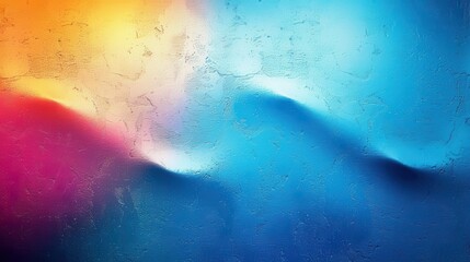 Fototapeta premium A visually striking abstract image featuring a blend of various colors including orange, yellow, blue, and red with smooth gradients and a subtle textured surface.