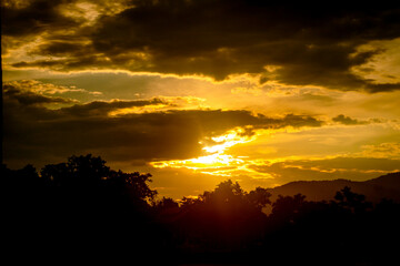 The beautiful cloud on the background of sunset. Wide angle