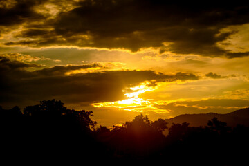 The beautiful cloud on the background of sunset. Wide angle