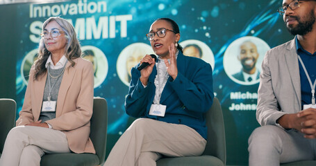 Stage, woman and presenter at seminar as event host, panel discussion or guest with microphone....