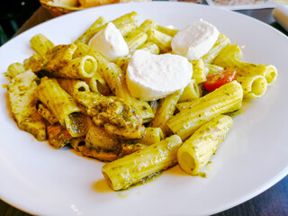 Salad made from radiatori cooked pasta, goat cheese and oil vinaigrette