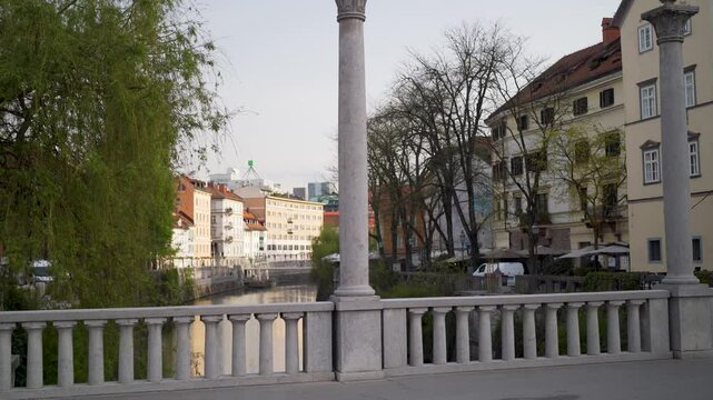 Crossing stone bridge with collumns in Ljubljana Slovenia