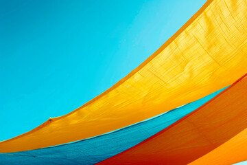 colorful umbrella with sky in background