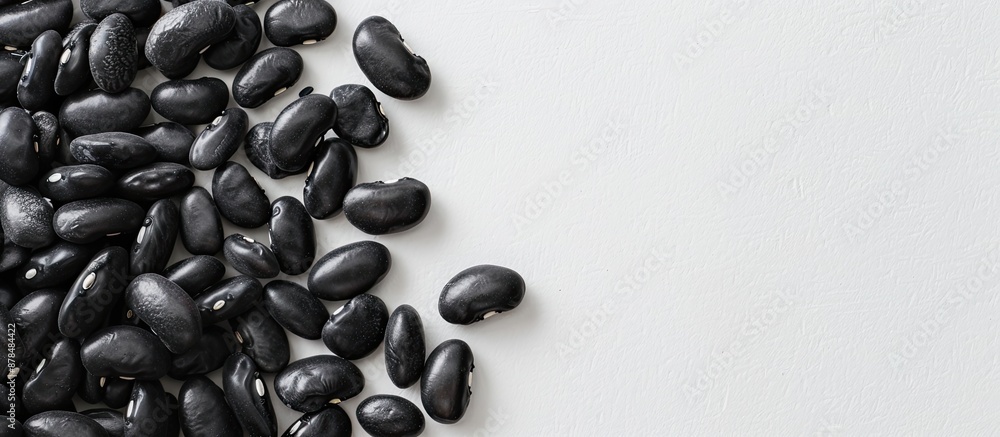 Aufkleber Black beans arranged neatly with plenty of white space around them for additional elements in a copy space image.