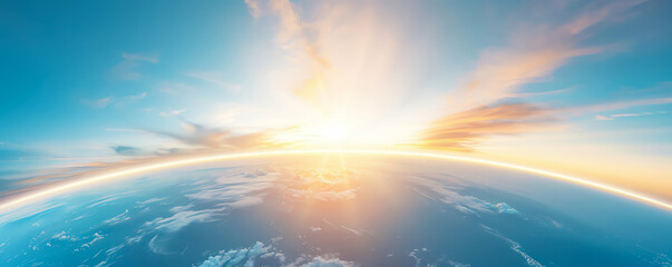 Obraz premium A breathtaking view of the Earth's horizon with a beautiful sunrise, showcasing the vastness of space and the beauty of our planet.