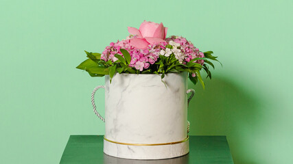 Bouquet of flowers isolated on green background