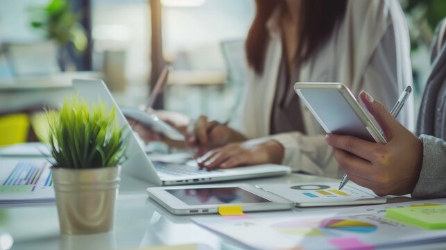 Team of marketers working in an open-plan office