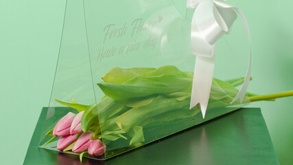 Bouquet of flowers isolated on green background
