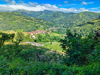 Taballes village and Pe&ntilde;amayor Sierra in background, Bimenes municipality, Comarca de la Sidra, Asturias, Spain