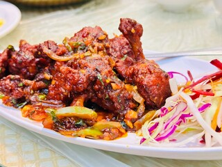 Chicken lollipops on blurred background 