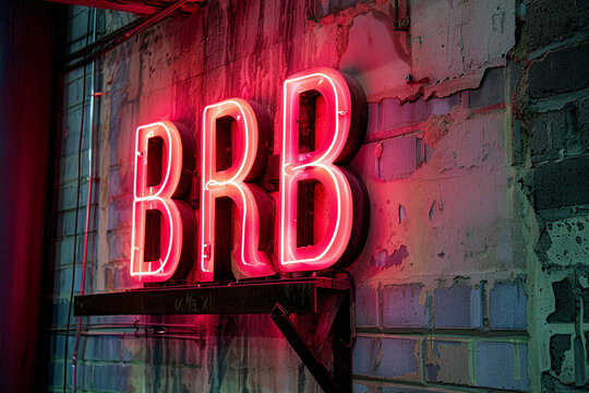Illuminated BRB neon sign. Be right back abbreviated neon sign. 