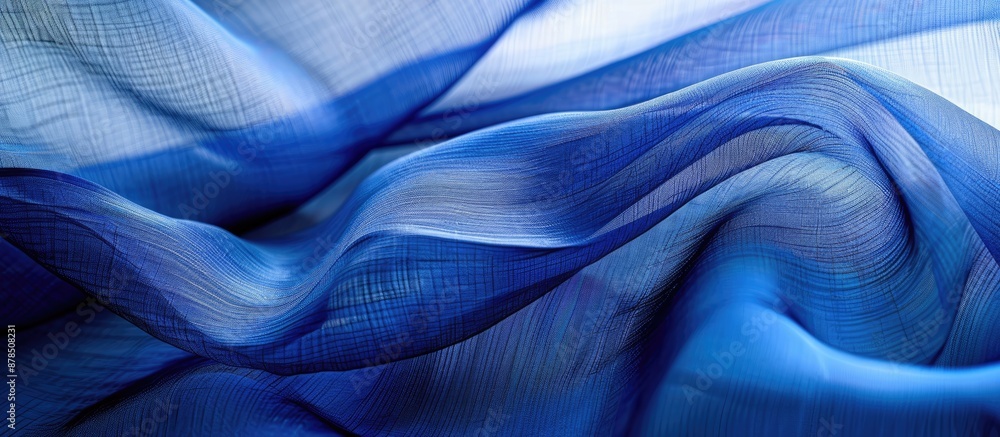 Poster silk organza in blue with wavy border and open weave creates a textured wave background for a copy s
