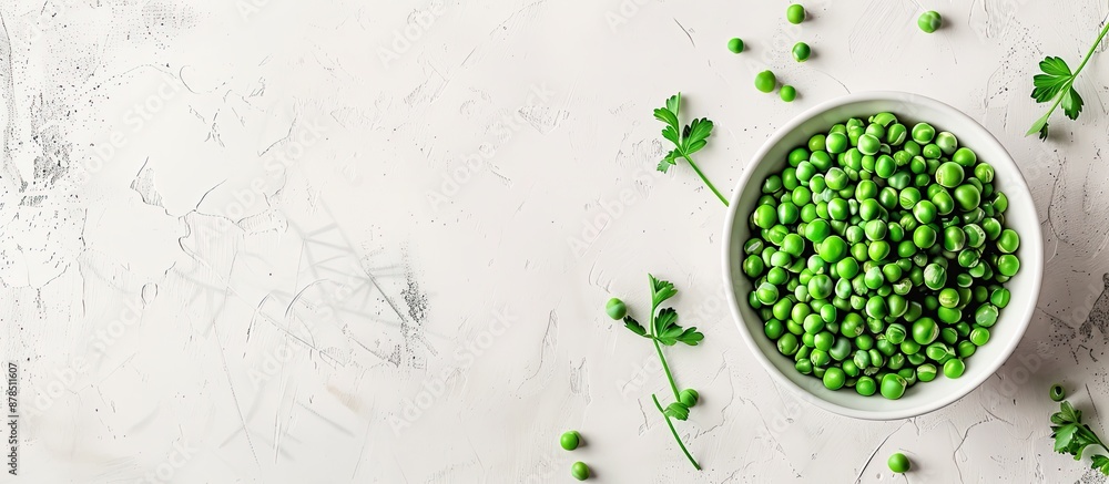 Aufkleber top-view bowl of fresh peas on a white backdrop with ample copy space image available.