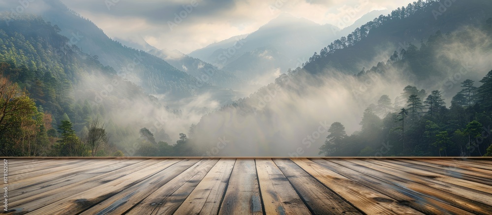 Poster mountain backdrop with misty fog gives a rustic feel to this wood floor setting, perfect for a backg