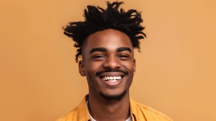 Obraz premium A man with a mustache and dreadlocks is smiling and looking at the camera. He is wearing a yellow shirt and white shirt underneath