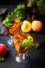 Cold ice tea with peach and mint