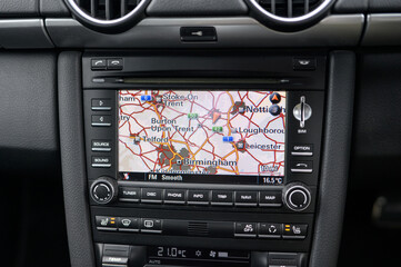 Fototapeta premium Car GPS Navigation System Display: High-Resolution Interface with Maps and Directions in Modern Vehicle