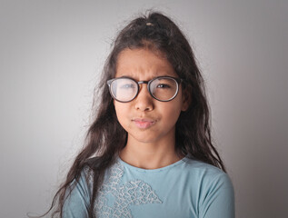 Obraz premium young girl with a pout