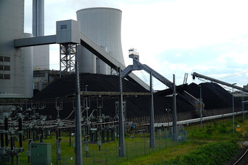 Large coal dump at coal-fired power plant in Hannover, Lower Saxony, Germany. An old technology...