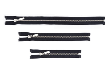 Black metal zipper isolated on white. Cutout zipper object. Vintage style clothing accessories. Sewer element background. Fastener isolated. Shiny metal silver zipper teeth. Various sizes lengths.