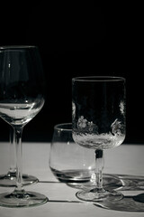 Assorted glassware for various drinks in sunlight