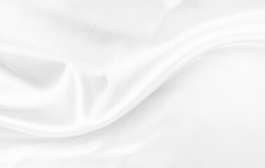 White gray satin texture that is white silver fabric silk background with beautiful soft blur pattern natural.