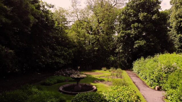 Victorian style English garden wide aerial drone 