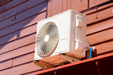 home air conditioner coil or condenser with motor installed outside the building perform cooling...