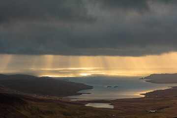 United Kingdom, Scotland, Shetland Islands, Mainland, Ronas Hill, growing storm and ray of sunshine seen from the highest point of the Shetland Archipelago, rising to 450 meters above sea level