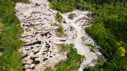 roads in the middle of the Amazon jungle, deforestation and sand extraction for construction is one...