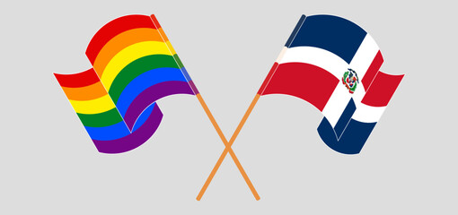 Crossed and waving flags of LGBTQ and Dominican Republic