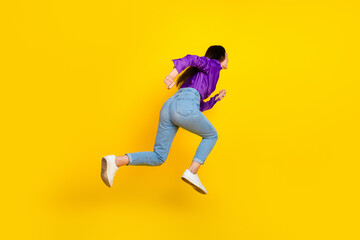 Photo of positive lady jump run fast isolated bright color background