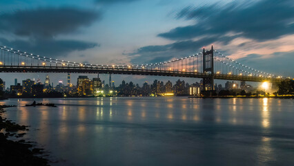 Fototapeta premium Bridge over East River at NYC- USA at sunset
