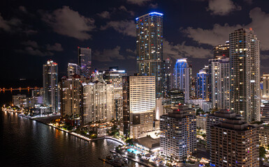 Miami, Florida skyline aerial view nighttime cityscape.