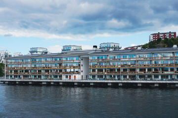 Fototapeta premium Moderna apartment buildings by the water